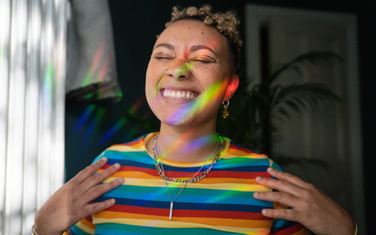 A smiling neurodivergent woman, representing the question "How can I tell that my partner's ADHD traits are affecting me?"